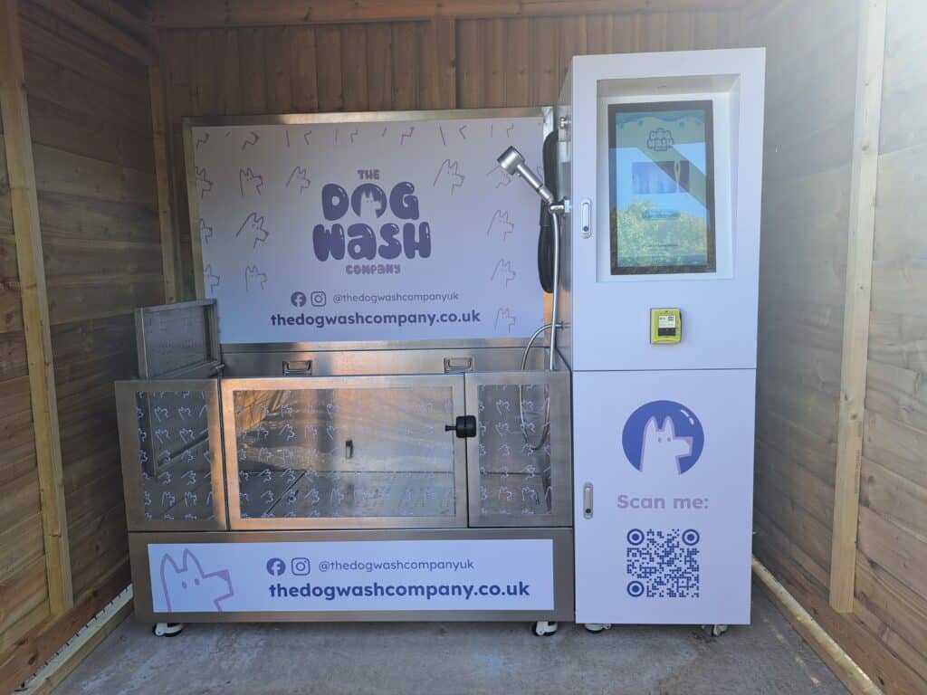 Self-service Dog Wash Company unit in a covered wooden shelter at Foxholes Farm Dog Park