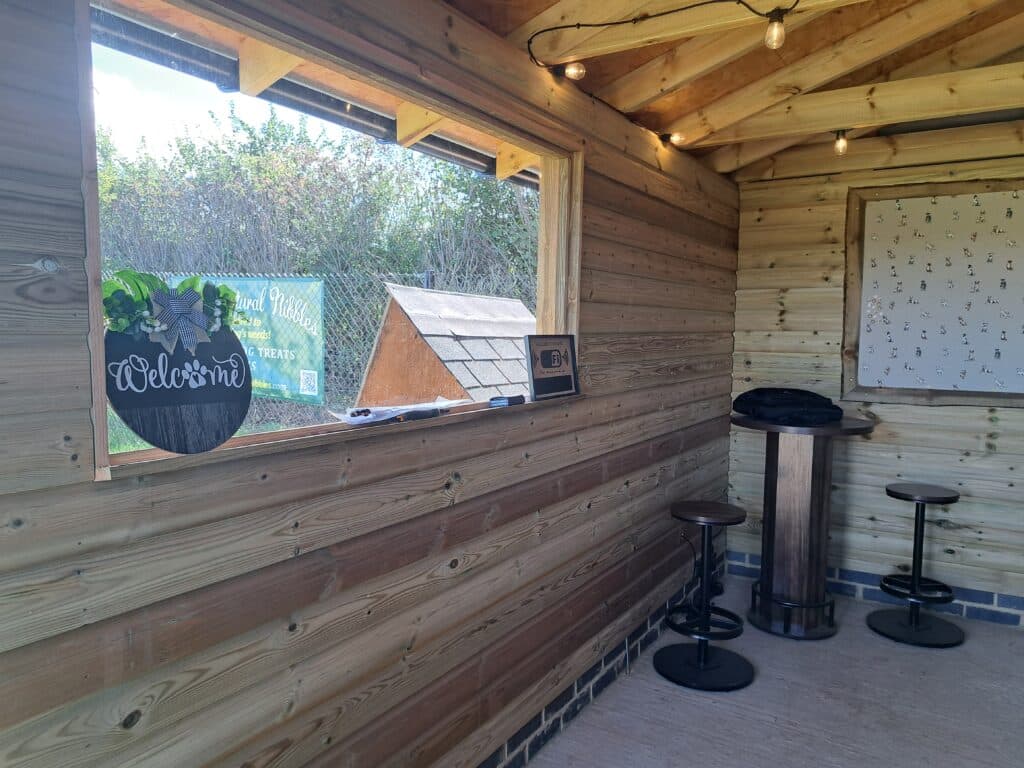 Indoor seating inside the Foxholes Farm cabin